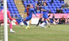 Ronan Hale guide the ball into the net to give Ross County the lead at Inverness.  Image: Sandy McCook/DC Thomson
