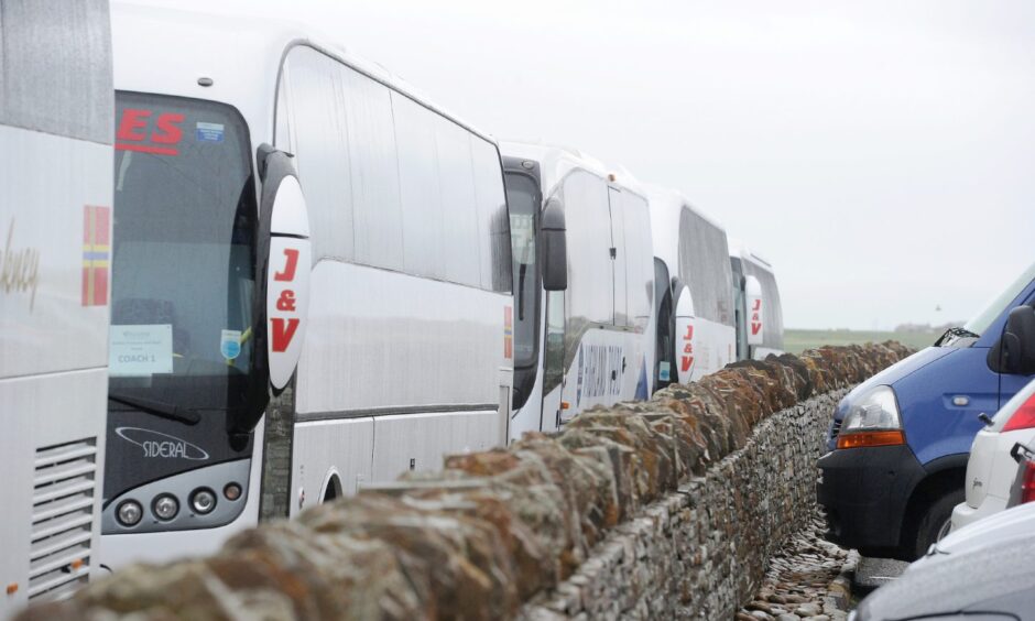 Coaches lined up at Skara Brae. 