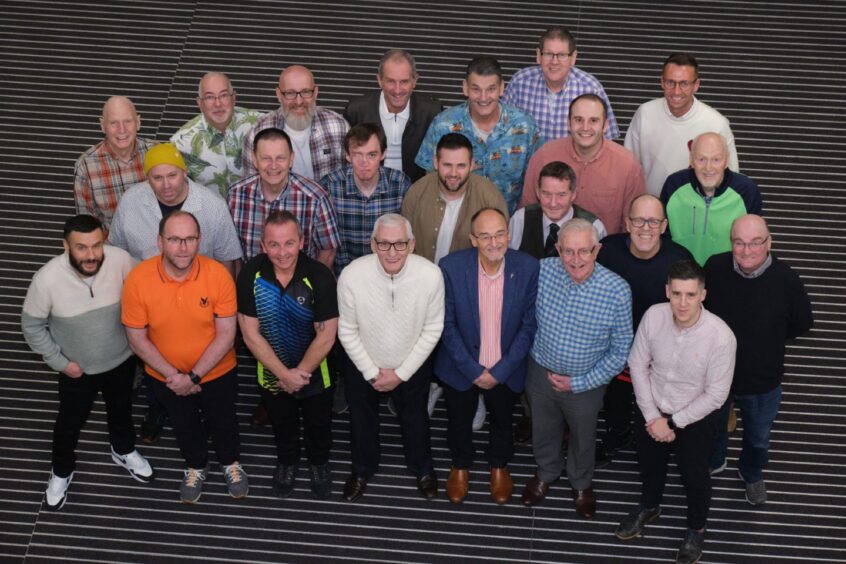 A group photo of all the male models from the Brave 2024 event.