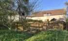 Image shows the Peterculter garden fence that was erected without permission.