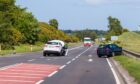3 June 2024. A9 at junction with B9176, Skiach Services,Evanton,Scotland. This is the scene of the 2 vehicle RTC involving a White Jaguar SUV and Blue VW Car at the junction. Police were conducting full accident investigation. Credit - Jasperimage
