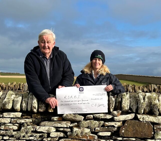 Steven Metcalf, Charlie Gorn's friend and estate exectir, with RSABI chief executive Carol McLaren in Orkney.