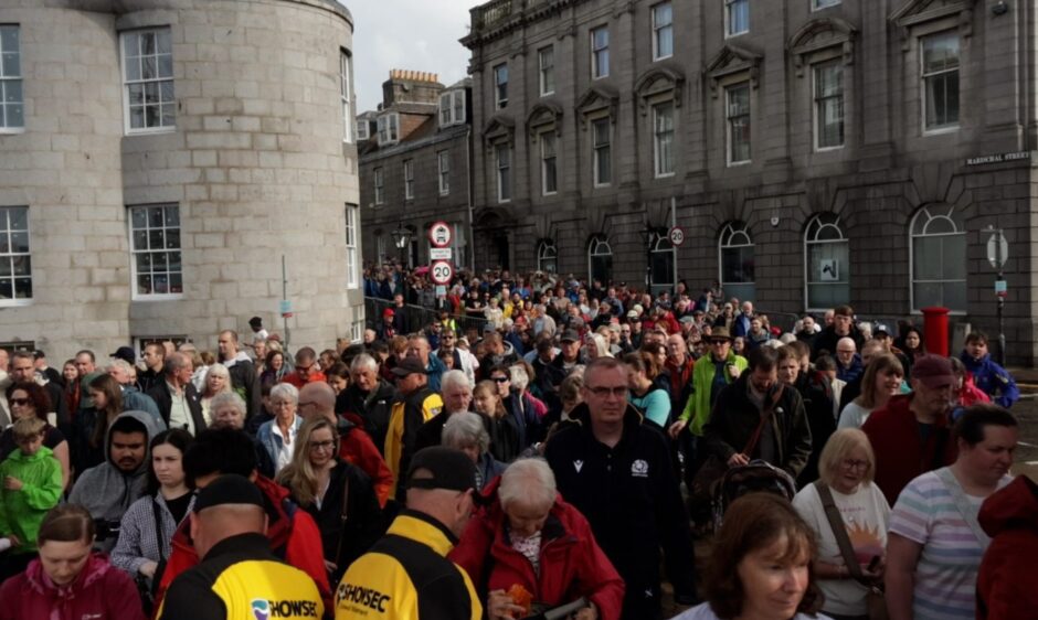 Crowd of people heading to Tall Ships festival 
