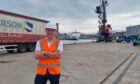 Chris at the yard. Colleagues have spent days clearing to the site in preparation for thousands of visitors.