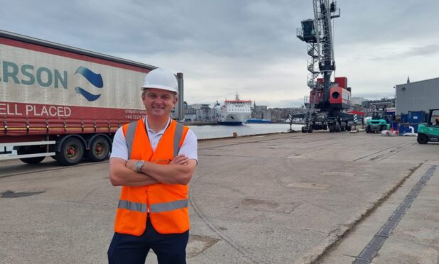 Chris at the yard. Colleagues have spent days clearing to the site in preparation for thousands of visitors.
