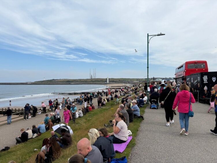 Crowds gather at beach for Red Arrows 