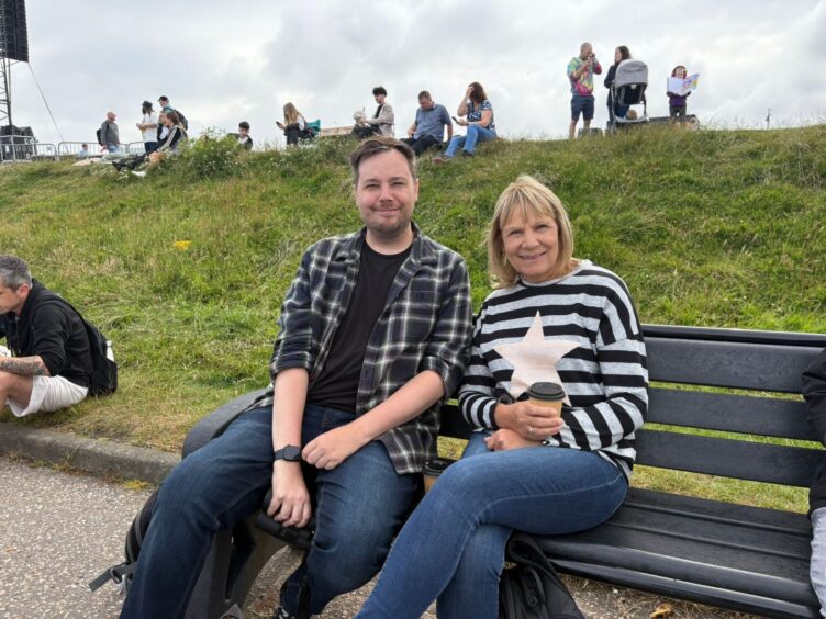 Lynne and Jamie sitting on bench 