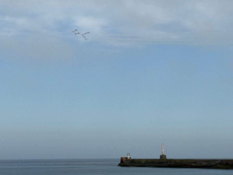 Red Arrows over lighthouse 