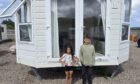 Donald Stewart's children Mia, eight, and Junior, 10, may have to leave school because of Aberdeenshire Council's legal action. Image: Donald Stewart