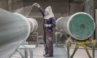 Spray coating in action at eBlast's Kintore facility. Image: eGroup