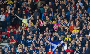 What is the role of a football supporter liaison officer?
