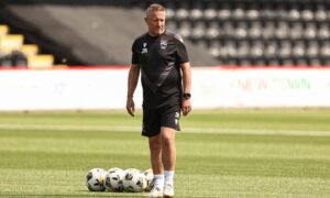 Ross County assistant manager John Robertson setting up the balls in the warm-up before the SPFL Championship fixture between Airdrieonians and Ross County on August 2, 2025 at the Albert Bartlett Stadium, Airdrie.