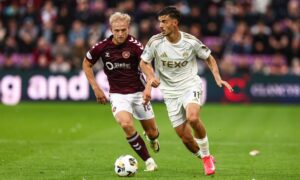 Hearts' Harry Milne (L) and Aberdeen's Nicolas Milanovic (R) in action during the 2-0 loss at Tynecastle.