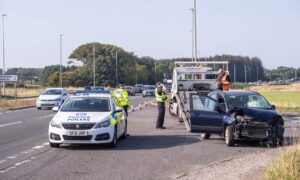 Police in attendance at the crash at Portlethen.