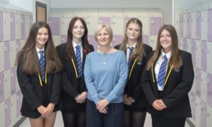 Lossiemouth High School students Ava Luce, Eilidh Regan, Head Teacher Caroline Boyd, Amelie Coghill, Robyn Jamieson. Image: Jason Hedges/DC Thomson.