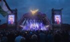 Belladrum main stage lit up in the dark.