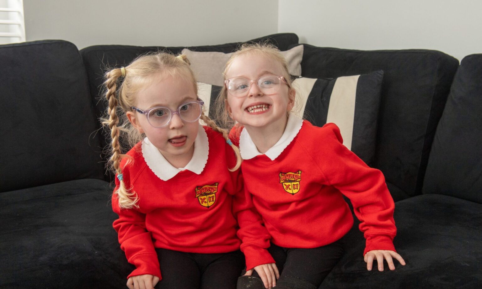 ‘My twins were born with holes in their brains – I’m so proud they are at school’