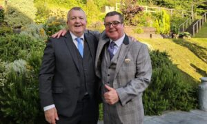 Chris, left, and Austin Birks in July 2023. Austin has had stage 4 cancer since 2018. Image: Chris Birks