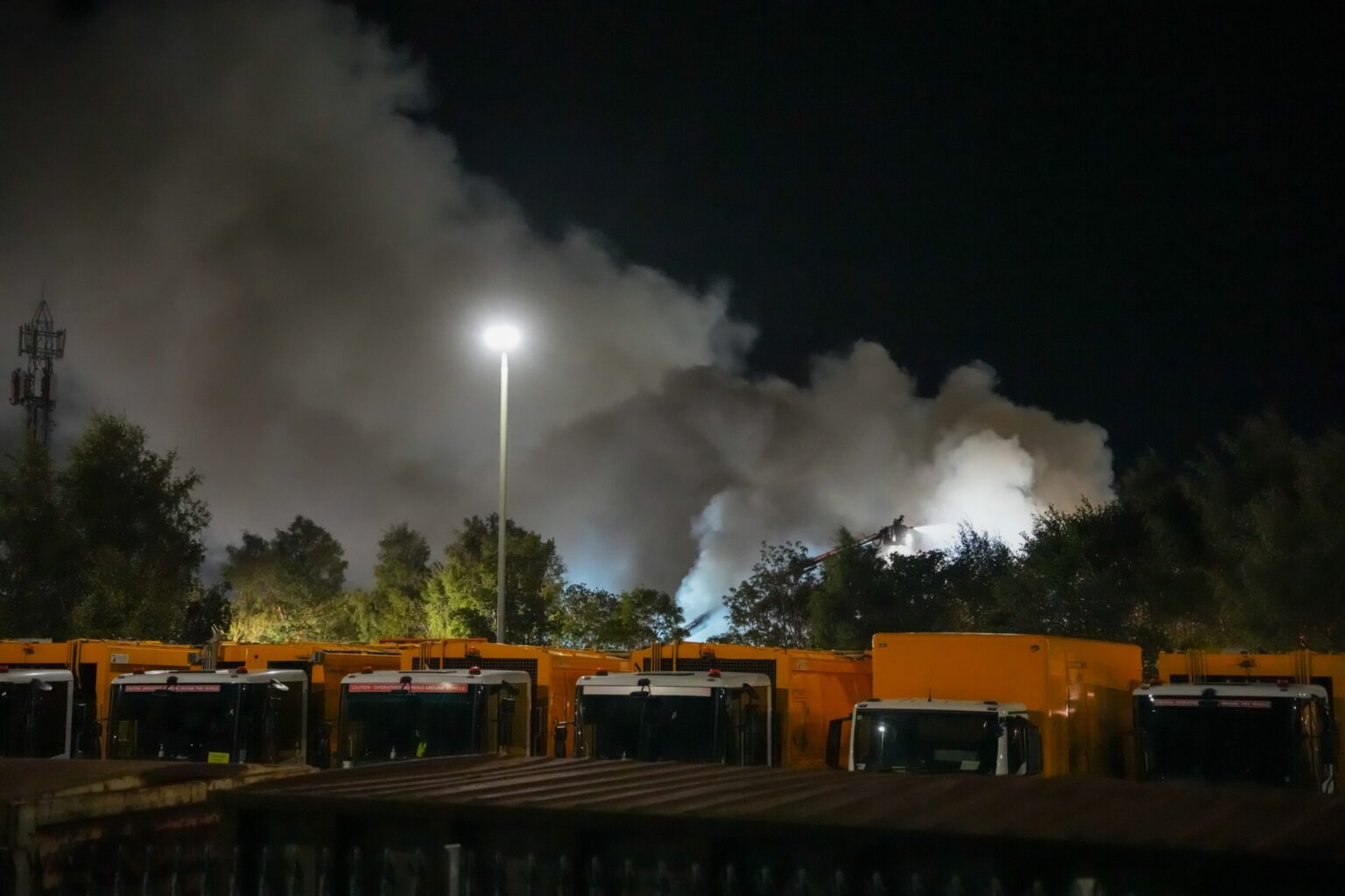 Crews remain scene at Elgin scrap yard blaze