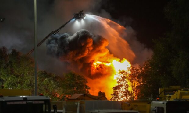 Crews tackling the fire in Elgin. Image: Jasperimage.