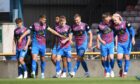 Caley Thistle players celebrate after David Wotherspoon opened the scoring against Peterhead in League One at th Caledonian Stadium, Inverness, on August 9, 2025.