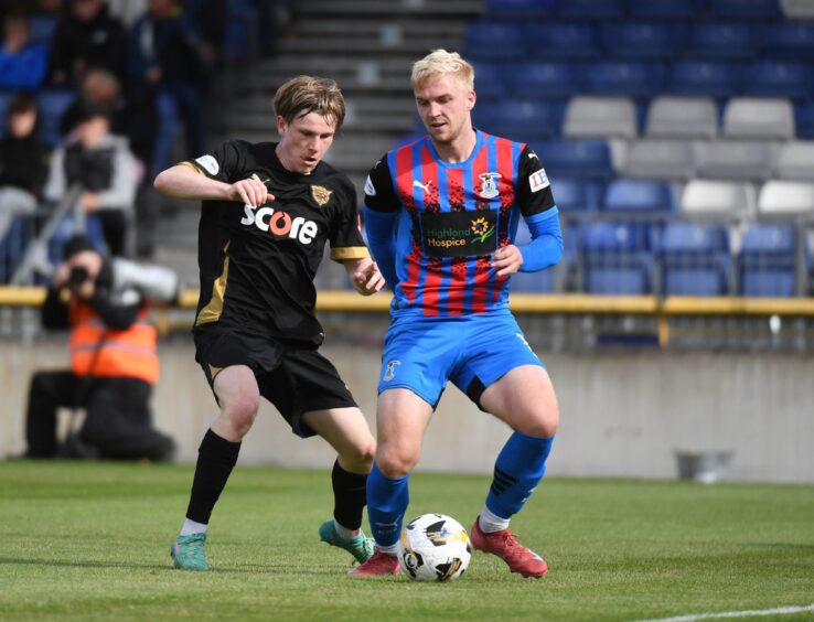 Peterhead trialist Flynn Duffy is tracked by Inverness Caledonian Thistle's Luis Longstaff in the SPFL League One match at the Caledonian Stadium, Inverness, on August 9, 2025. 