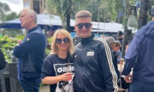 Ryan and wife Becky in Oasis t-shirt and track top.