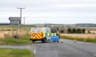 Police on the scene at the A952 road near Lonmay. Image: Jasperimage.
