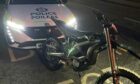 E-bike seized with Police car behind it