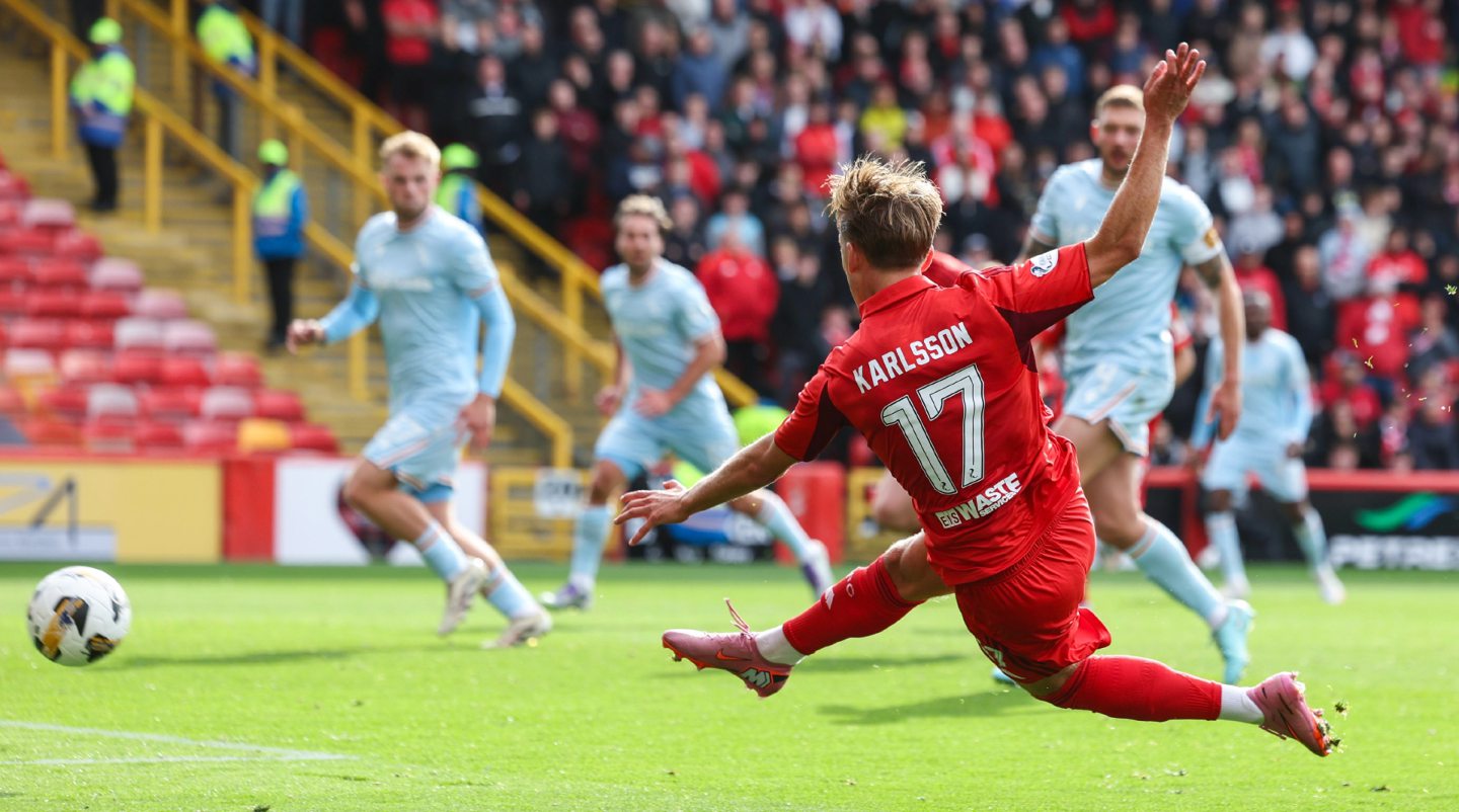 Aberdeen's Jesper Karlsson shoots against Motherwell in the Premier Sports Cup quarter-final at Pittodrie.