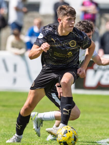 Inverness Caledonian Thistle full-back Calum MacLeod on the ball against Clachnacuddin in a pre-season friendly at Grant Street Park, Inverness, on June 28, 2025. 