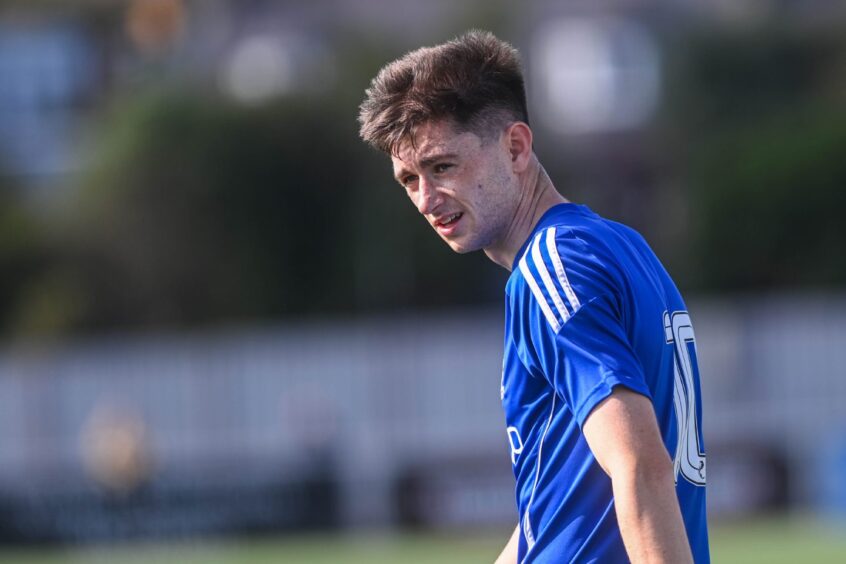 Cove Rangers midfielder in action against Montrose in an SPFL League One match at the Balmoral Stadium, Cove, Aberdeen, on August 31, 2024. 
