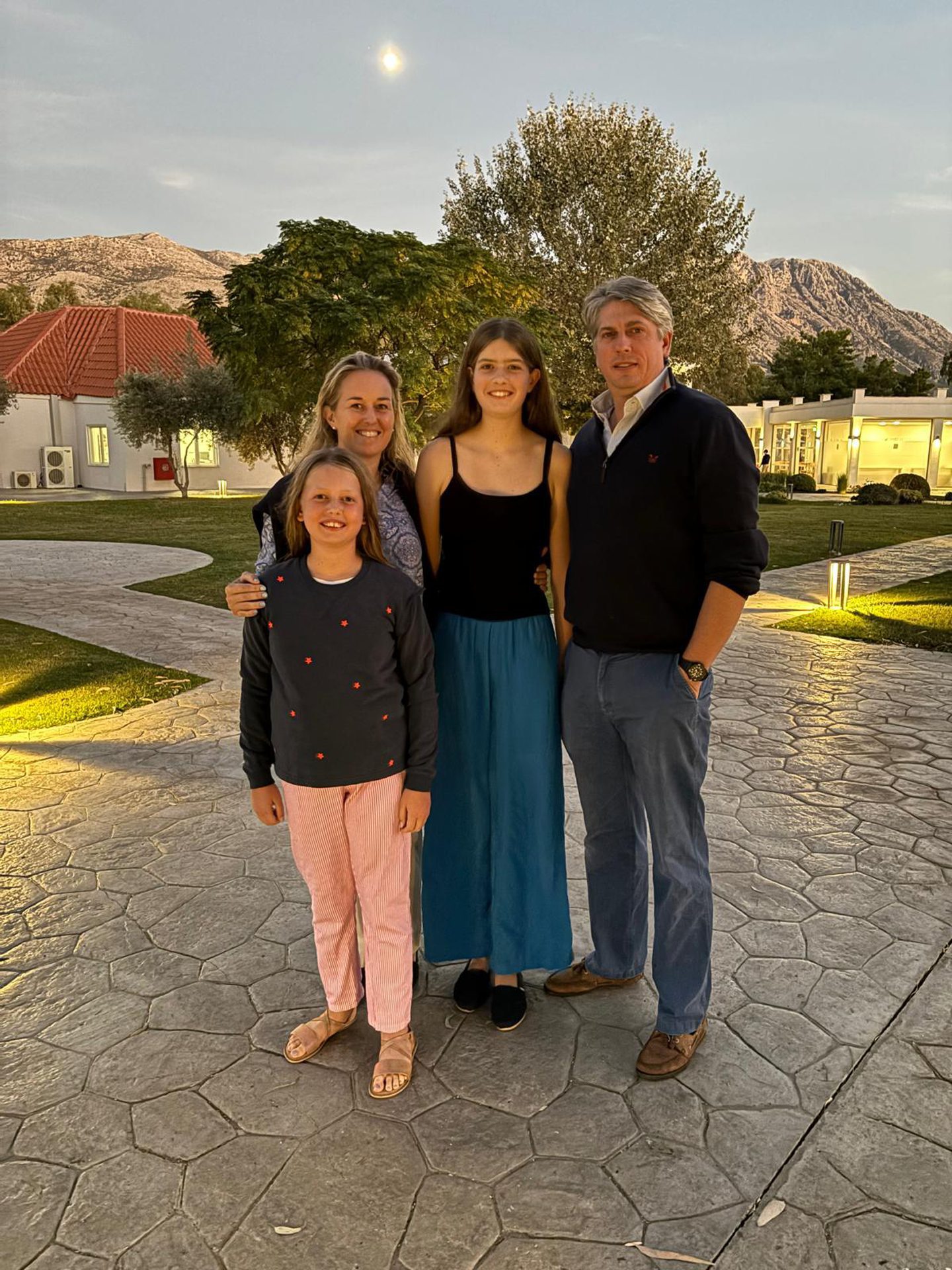 A group photo of Edward, wife Zoe and daughters Henrietta and Arabella in casual clothes on holiday