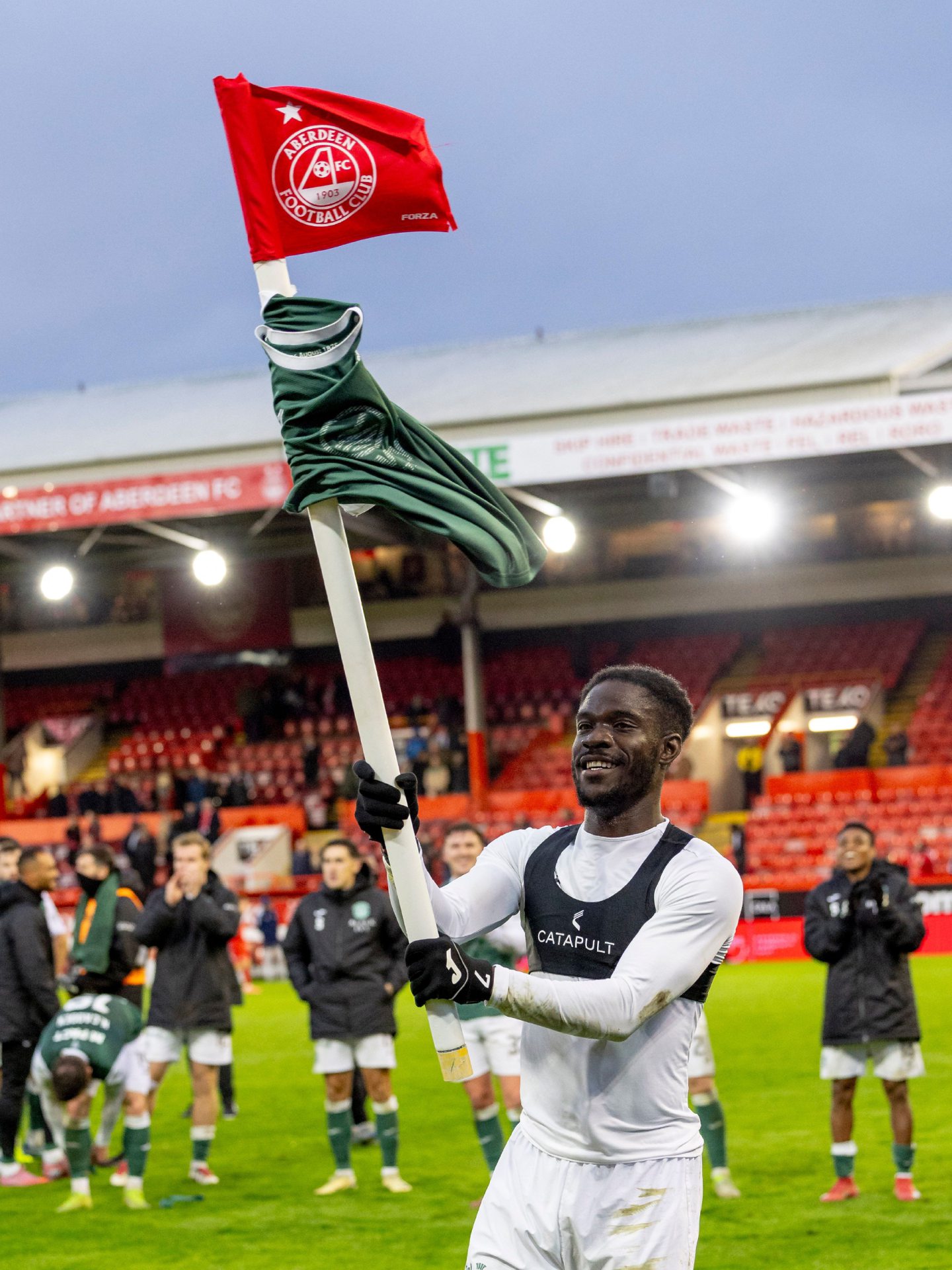 Elie Youan of Hibernian celebrates at full time during the Aberdeen v Hibernian William Hill Premiership fixture at Pittodrie