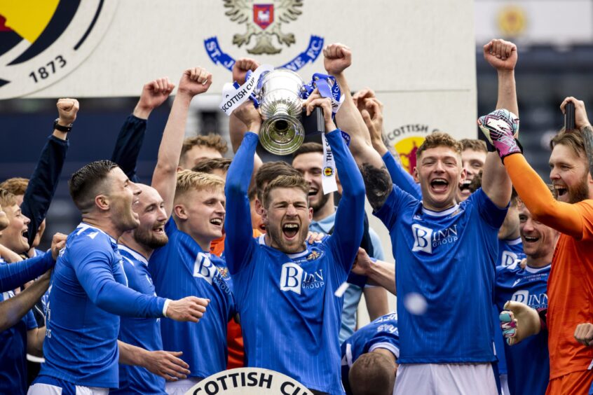 David Wotherspoon leads the St Johnstone celebrations after winning the Scottish Cup final against Hibernian at Hampden Park, Glasgow, on May 22, 2021.