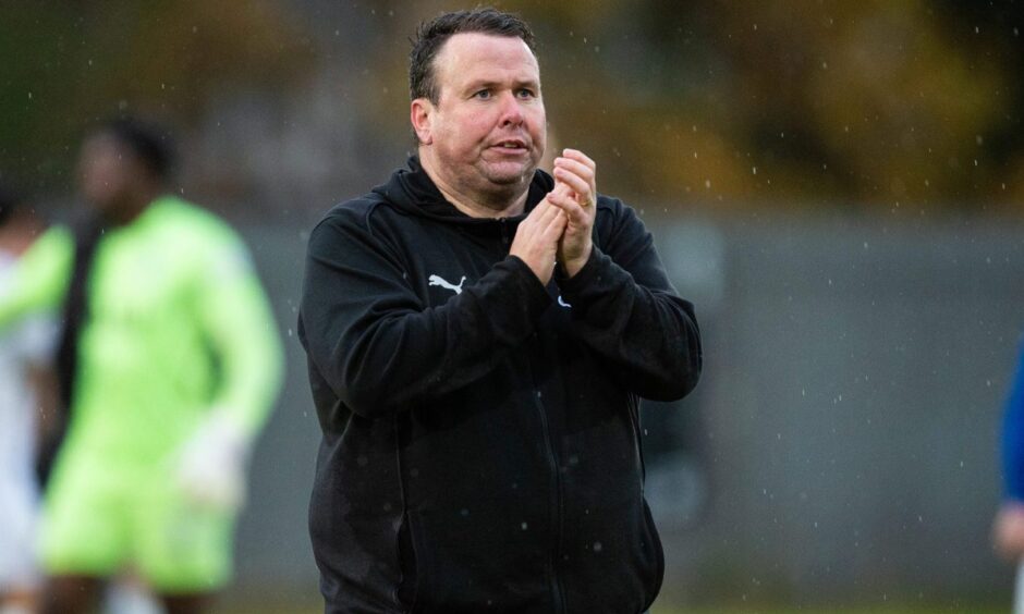Inverness Caledonian Thistle manaegr Scott Kellacher applauds the fans at full-time after an SPFL League One match between Dumbarton and Inverness Caledonian Thistle at the Marbill Coaches Stadium, Dumbarton, on October 26, 2024.