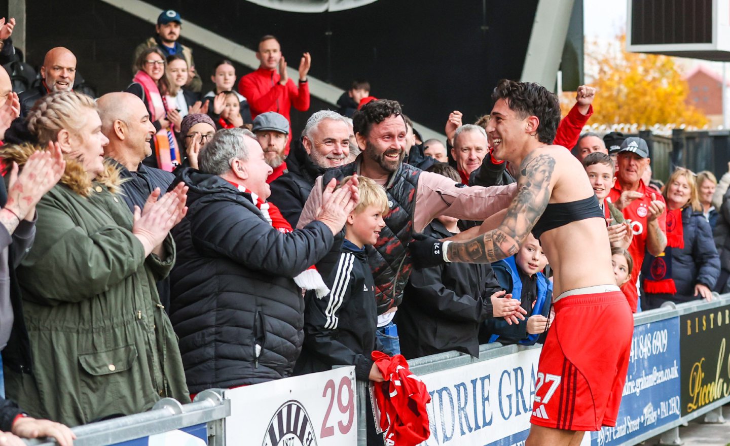 Aberdeen's Marko Lazetic with fans at full time during the 1-0 win at St Mirren.