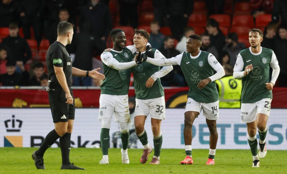 Hibernian's Elie Youan celebrates with Josh Campbell, Miguel Chaiwa and Daniel Barlaser (L-R) after scoring to make it 2-0 against Aberdeen. Image: SNS.