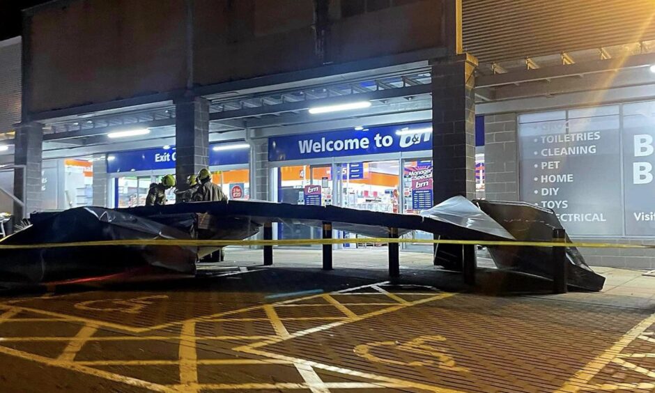 B&M sign fallen to floor