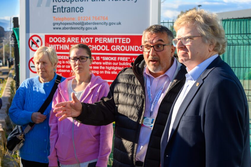 Aberdeen City Council co-leaders Christian Allard and Ian Yuill meeting Raac campaigners in Torry. Image: Kenny Elrick/DC Thomson