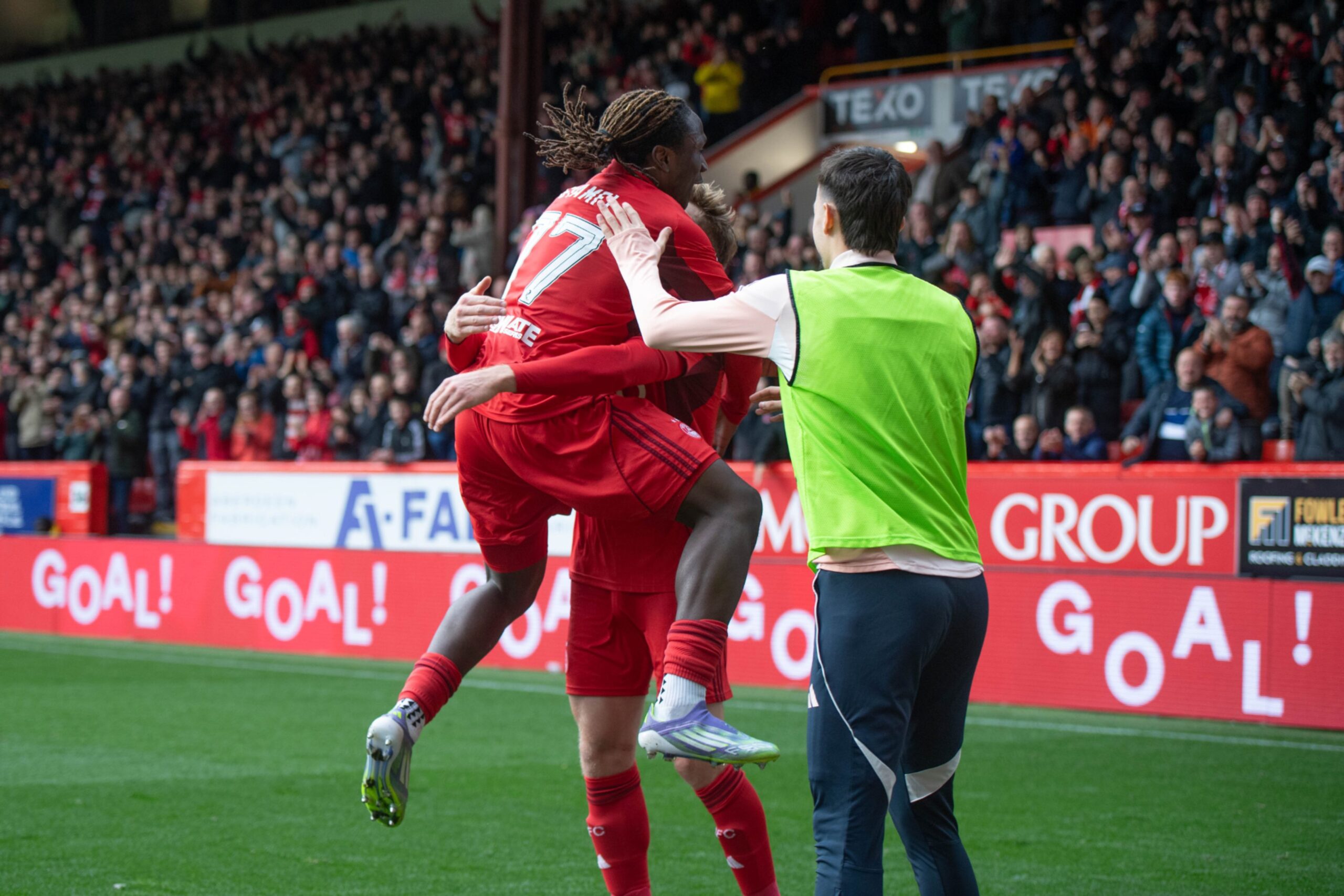 Emmanuel Gymalfi celebrating after scoring to make it 3-0 against Dundee.