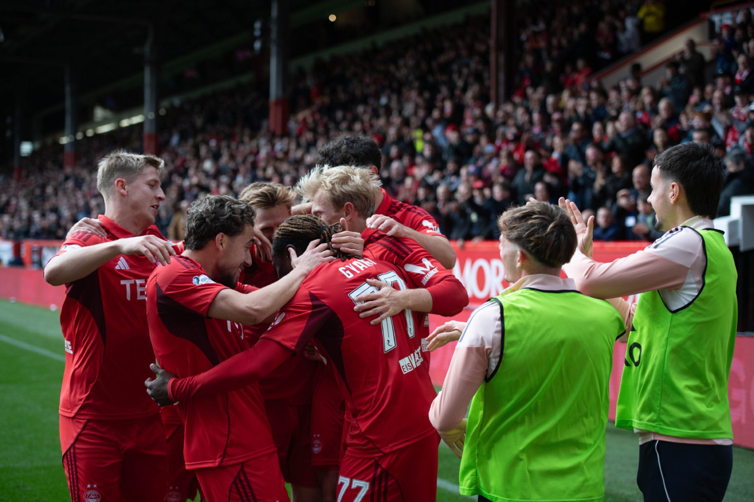 Aberdeen's Emmanuel Gymalfi celebrating after scoring to make it 3-0 against Dundee.