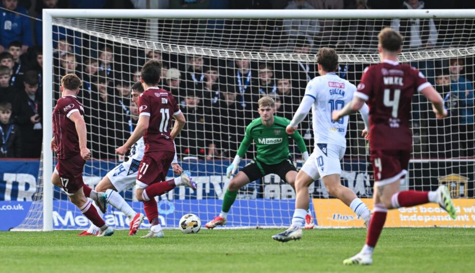 Arbroath's Findlay Marshall scores to make it 3-1 against St Johnstone. Image: SNS.