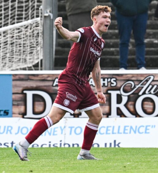 Arbroath's Findlay Marshall celebrates scoring to make it 3-1 against St Johnstone 