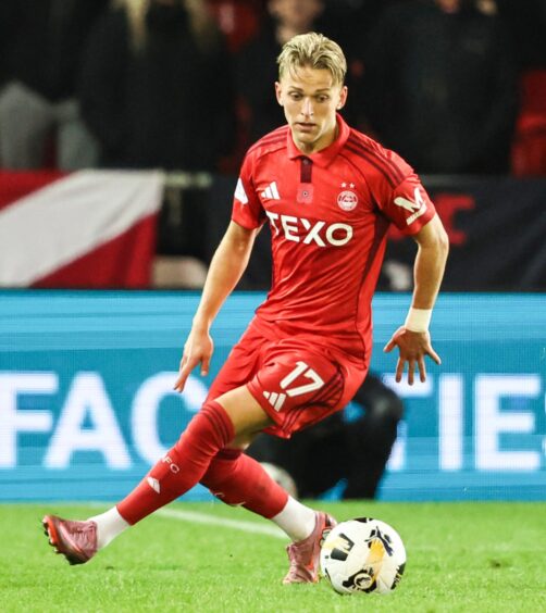Dons winger Jesper Karlsson has the ball at his feet at Pittodrie