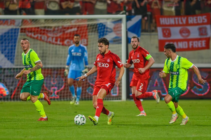 Aberdeen s Adil Aouchiche on the ball in the Uefa Conference League match against AEK Larnaca in Cyprus.