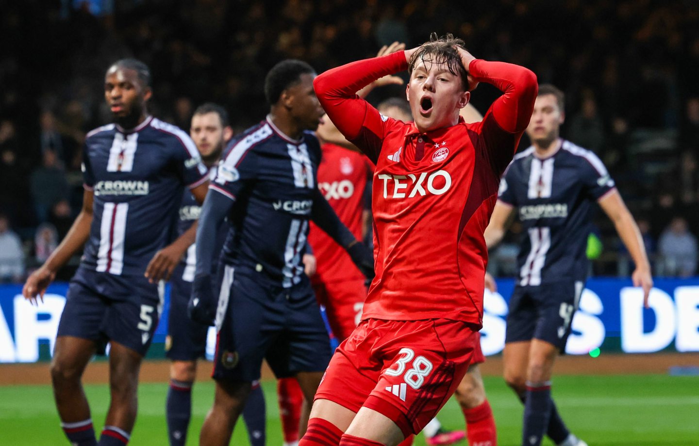 Aberdeen's Dylan Lobban looks dejected after missing a chance against Dundee.
