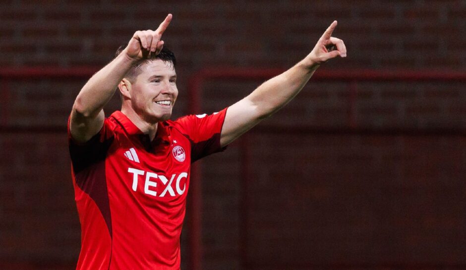 Aberdeen's Kevin Nisbet celebrates after scoring to make it 3-1 against Dundee.