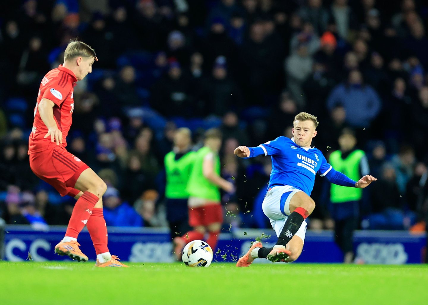 Mats Knoester of Aberdeen (left) and Connor Barron of Rangers in action.