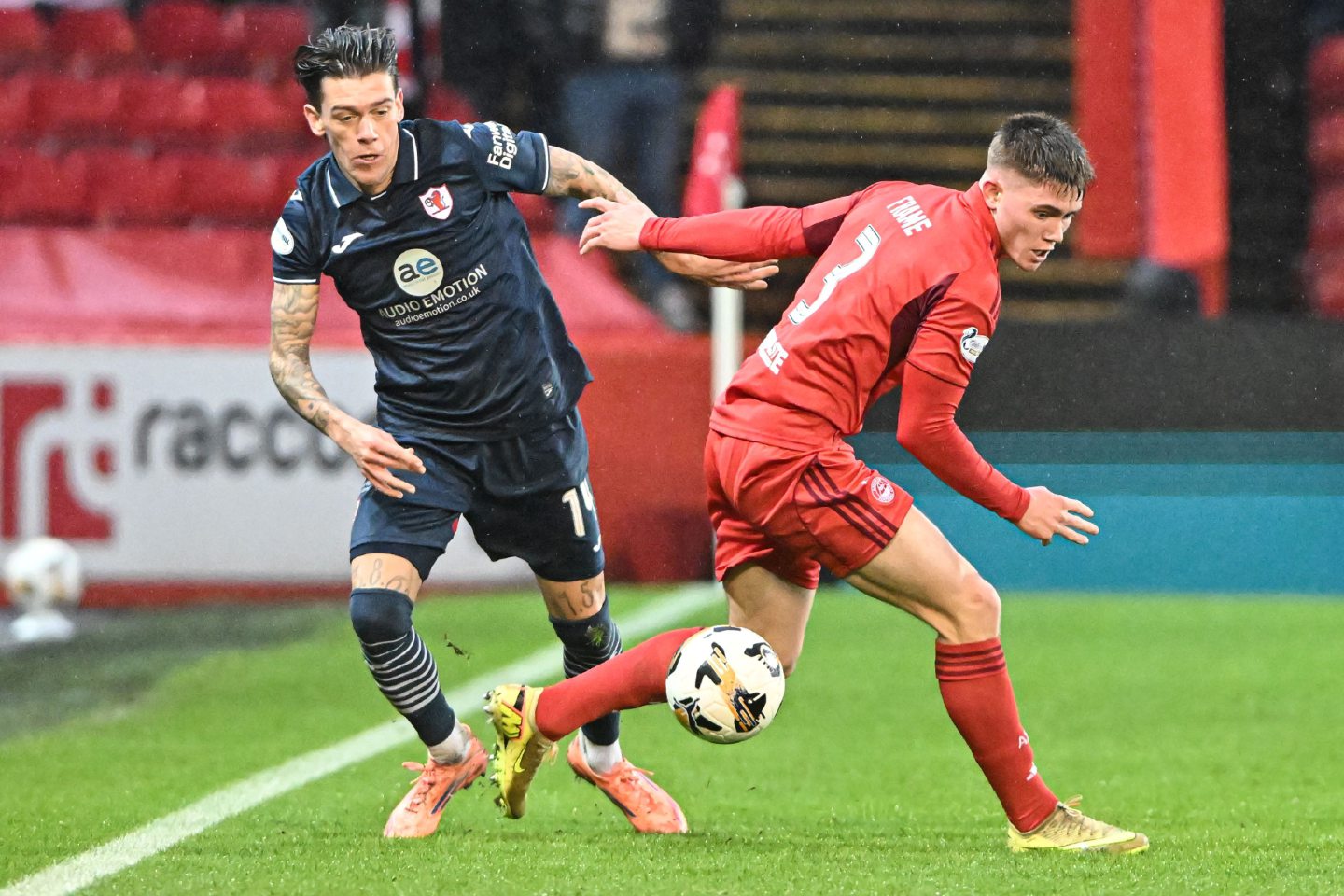 Mitchel Frame of Aberdeen and Josh Mullin of Raith Rovers in action